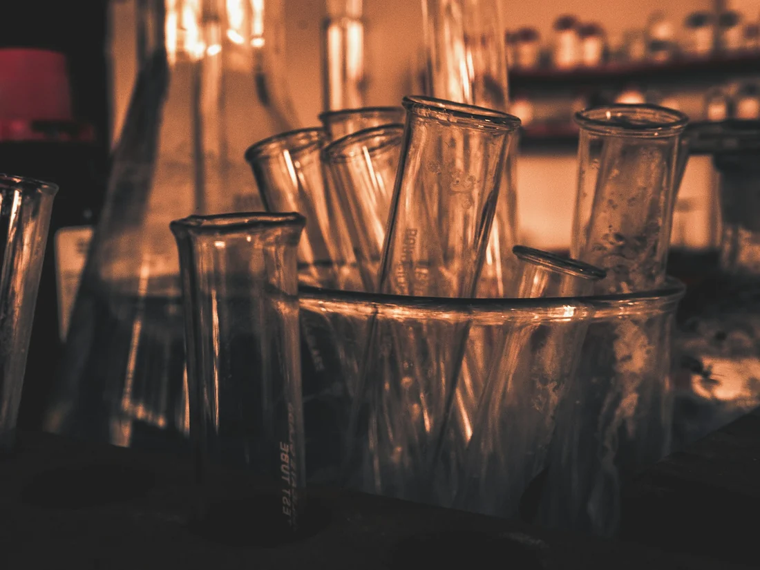 Laboratory glassware lit from behind